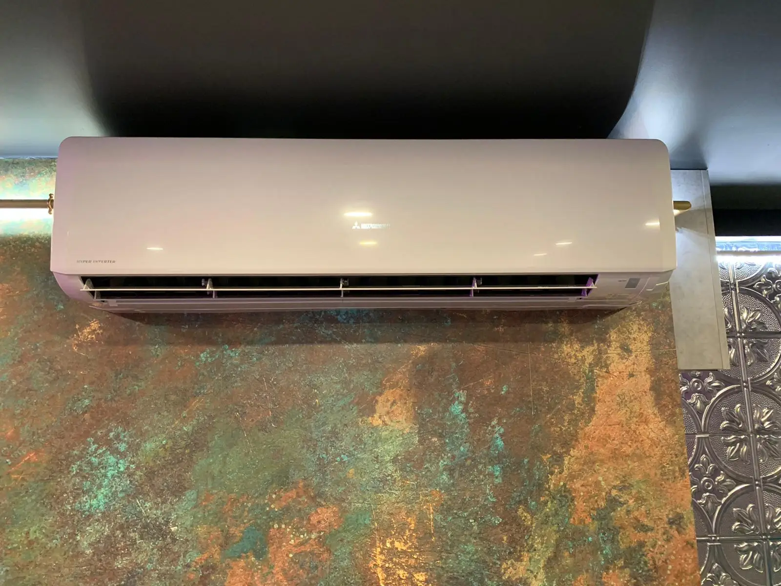Mitsubishi wall mounted ac unit installation in a restaurant in Edgeware road london