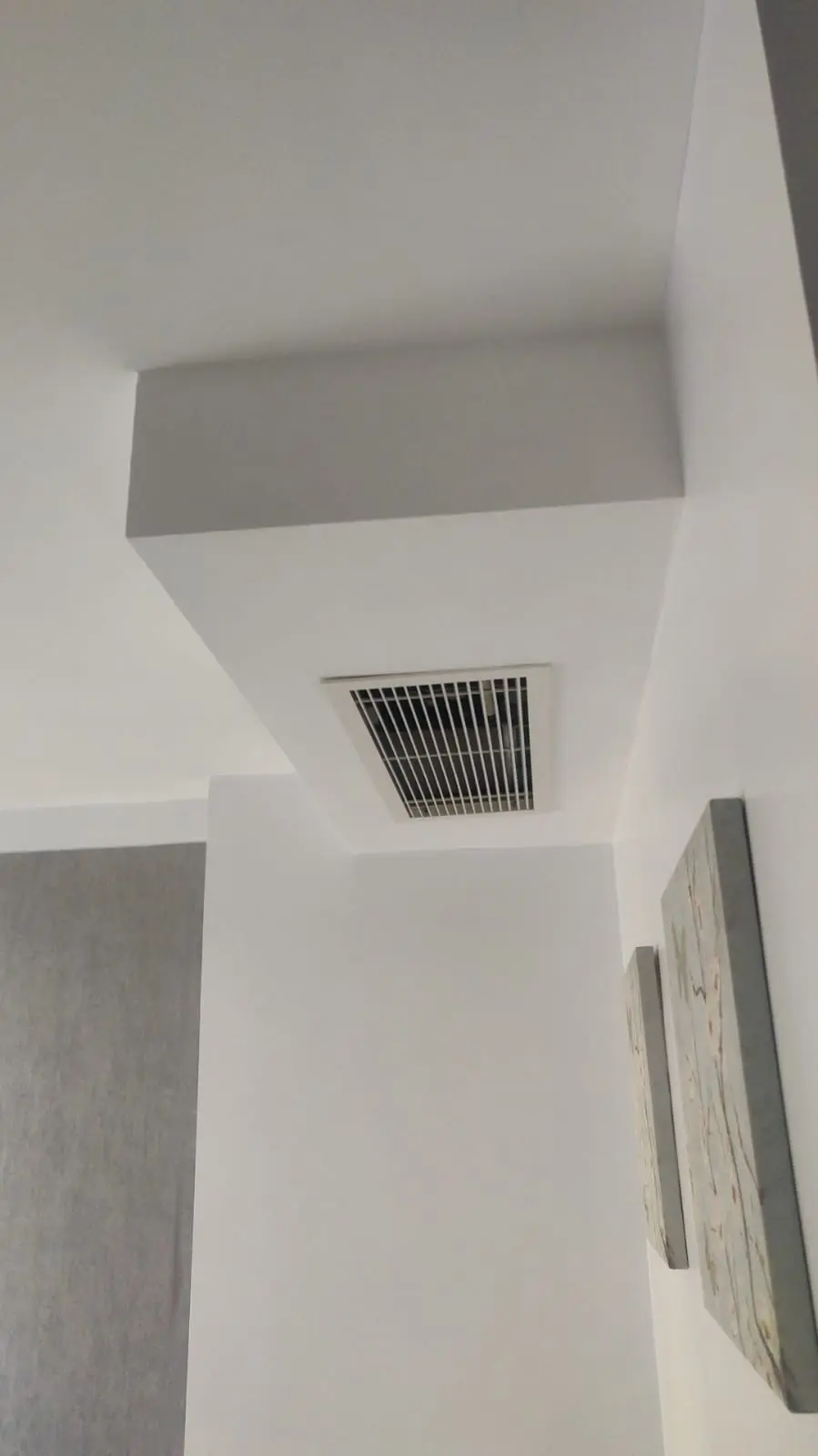 air conditioning ceiling slot diffuser installation in a residence in golders green